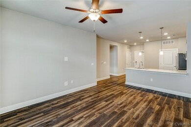 View of kitchen from living area.  Unit has 9' cei
