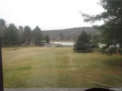 Porch - Enclosed. View of the 2 docks and the flat