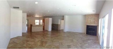 CUSTOM TAVERTINE THRUOUT HOME.