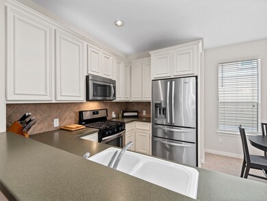 Kitchen with solid surface Silestone Quartz counte