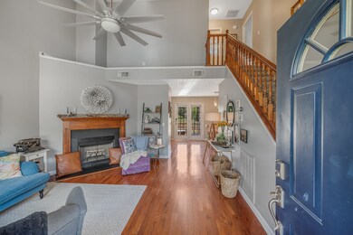Living Room  with Harwood Floors and Vaulted Ceiling