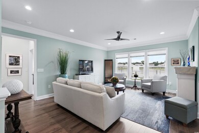 Living room featuring ornamental molding, ceiling 