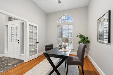 Just off the foyer, a private home office awaits, 