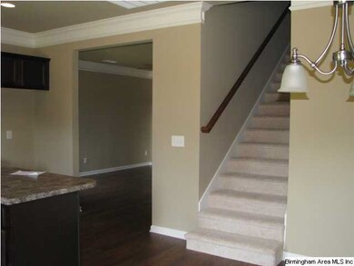 Stairs go off kitchen -  great for privacy!!