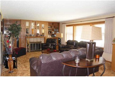 As you enter the home you will find this spacious 