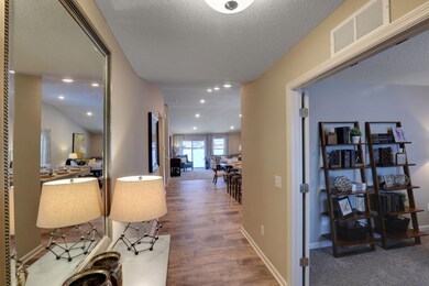 Foyer and flex room. Photos of model home. Options