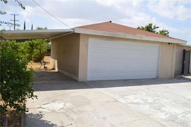 Two car garage plus carport. 