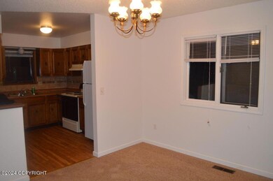 Dining to kitchen from old rental listin