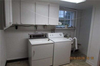 Laundry room with view of courtyard.