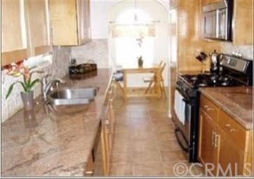 Updated kitchen with granite coutertops, stainless