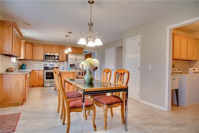 A view of the eat-in kitchen and first floor laund