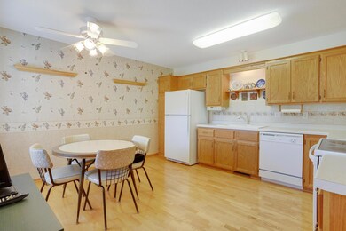 Kitchen offers hardwood floors.