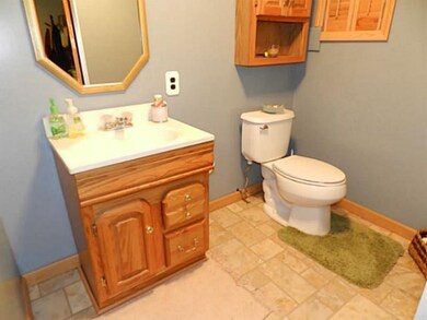 Bathroom. Powder room located in the lower level r