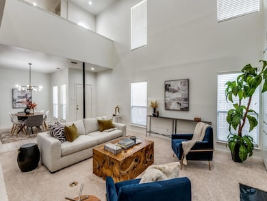 Newly carpeted living room with a healthy amount o