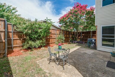 The backyard is low maintenance and just enough space for the pups, kiddos, or a new garden!