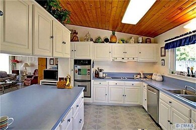 Bright Kitchen overlooking Family room