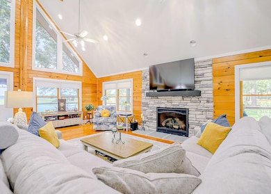 Great Room w/ gas Stone Fireplace