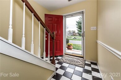 Front entrance and foyer with tile flooring