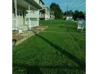 Exterior Front. Fenced in yard completely around t