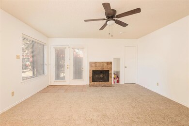 View from hallway to living and dining area.