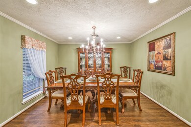 Elegant formal dinning room with gorgeous antique style chandelier.