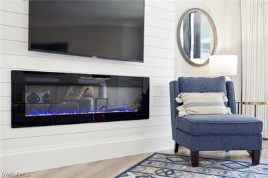 Sitting room featuring wood-type flooring