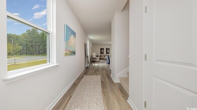 Corridor featuring light hardwood / wood-style floors