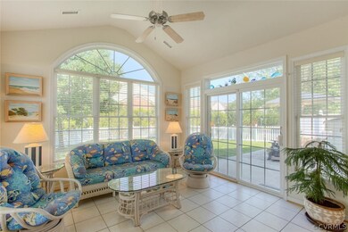 Florida Room w/Gorgeous Windows Overlooking Fenced