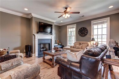 Gorgeous Designer Colors, Custom Crown, Fireplace Accented with Beautiful Mantle