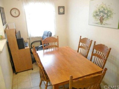 Dining room is sunny and bright! 