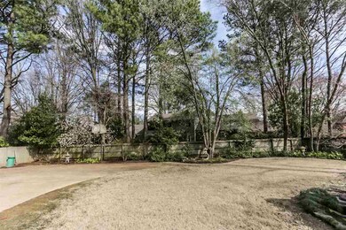 Private, tranquil, wood fenced back yard with matu