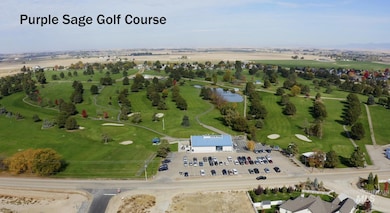 Aerial view of a large body of water and a local golf course