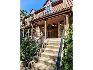 Exterior Front. Beautiful front porch and double d