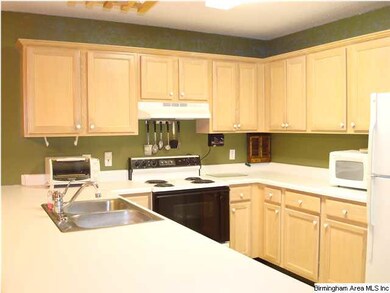 The kitchen is a cook's dream, with expansive coun