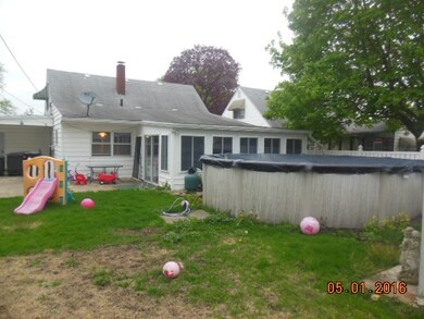Rear view with above ground pool