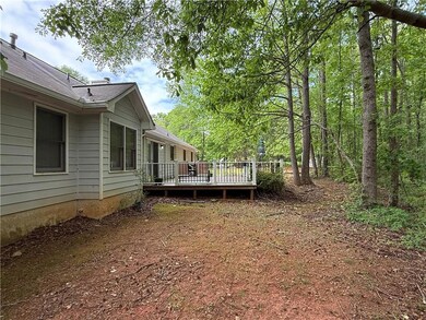 View of yard with a deck