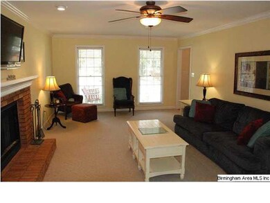 Large living room with fireplace. New carpet!