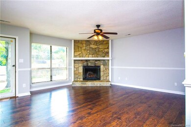 The family room is opened by the sun that shines in during the day and warmed by the fire at night!