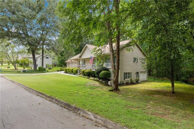 Large Side yard for access to lower Garage