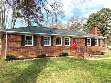 Single story home featuring a front lawn, crawl sp