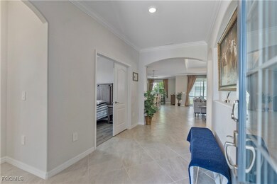 Foyer featuring crown molding