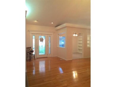 Interior Space/Layout. FRONT DOOR LEADS TO LIBRARY, FORMAL DINE AREA + FORMAL LIVING AREA.