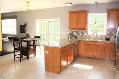 Kitchen as Large Bar Area that can seat 4 Stools a