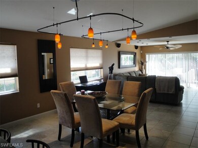 Large dining area with custom track lighting