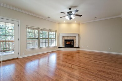 Main floor living room with gas log fireplace