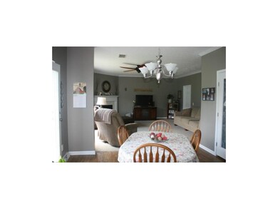 Looking into living room from dining area of kitch