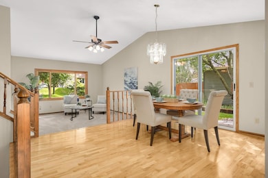 The open layout is highlighted by the vaulted ceilings.