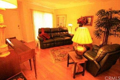 Living room has sliding glass door to patio