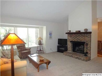 Another view of the family room - has fireplace (c