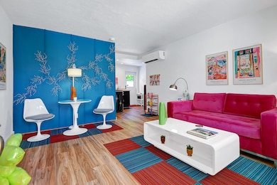 LIVING AND DINING SPACE REVERSE.jpg mls